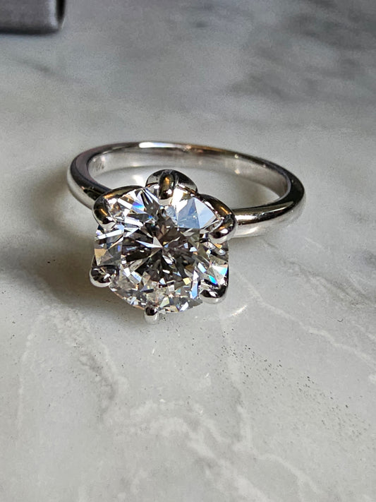 Petal engagement ring