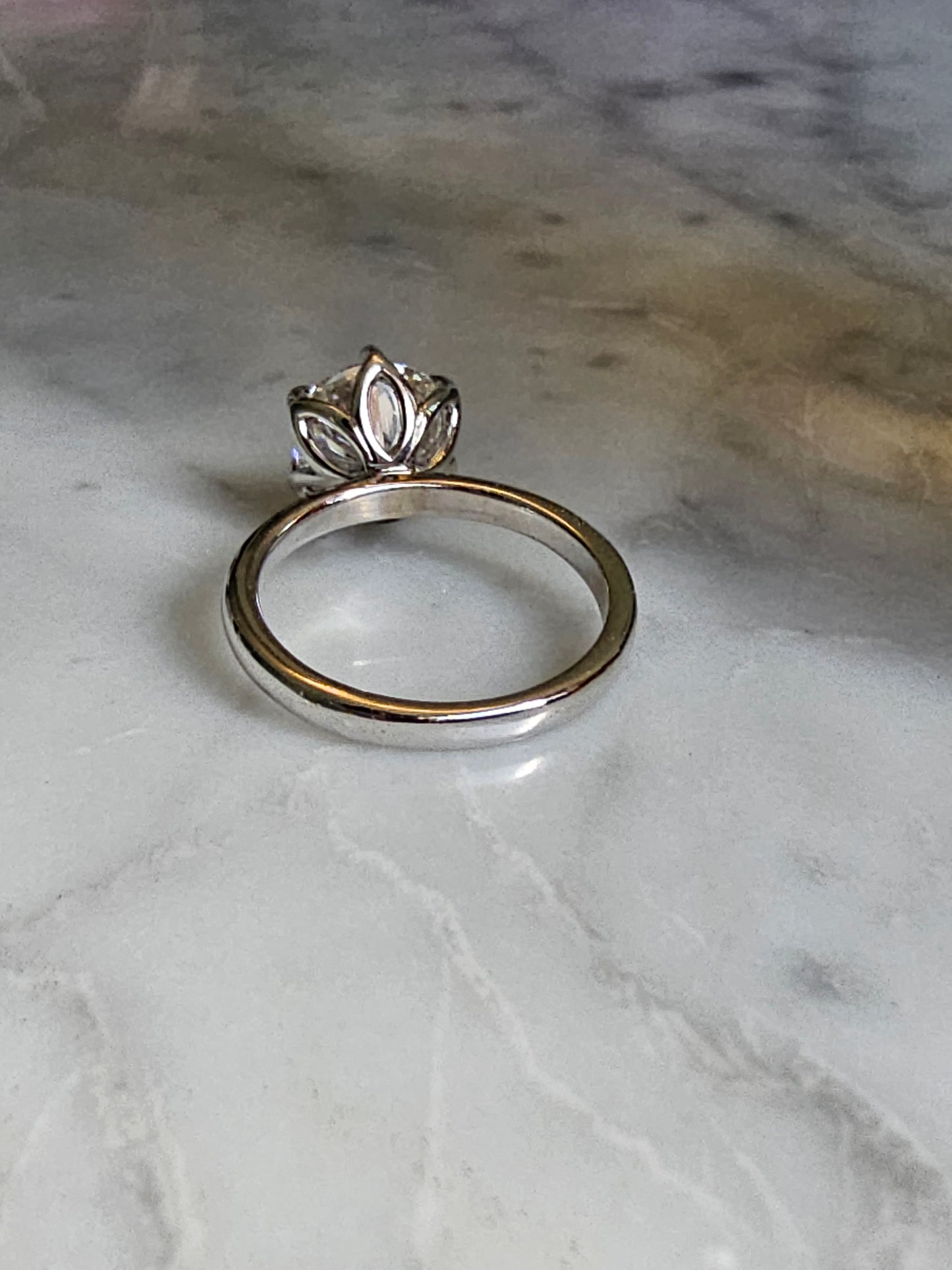 Petal engagement ring