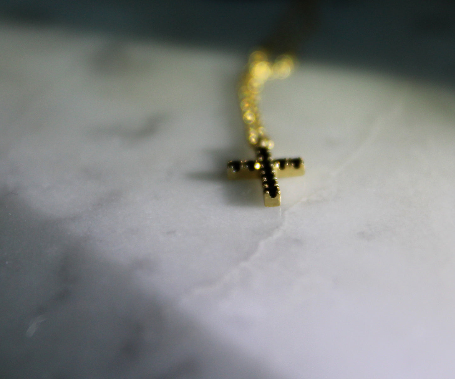 tiny black diamond cross necklace